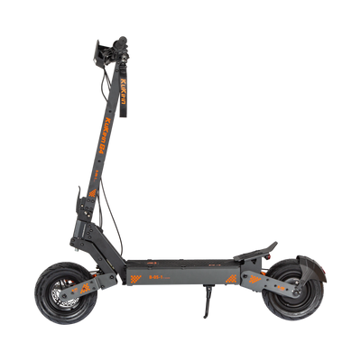 A black KUKIRIN G4 electric scooter with orange accents, featuring a large front tire and a smaller rear tire, designed for adult riders.